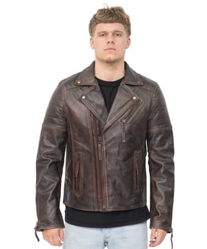 Dit jack, het middelpunt van een tijdloze look, is gemaakt van volnerf nappaleer voor een slim-fit, stijlvol bikersilhouet. Opvallende toevoegingen aan dit kledingstuk zijn onder meer geribde details op de schouders en een traditionele brede kraag. De voorkant van de jas is geaccentueerd met een dubbele ritssluiting en heeft een schuine zak met ritssluiting op de borst en nog twee zakken met ritssluiting. Deze jas is verkrijgbaar in verschillende kleuren voor verschillende smaken, zodat iedereen zijn ideale stijl kan vinden in dit klassieke Brando-stijlstuk. • 100% premium ultrazacht nappaleer. • Schuine borstzak met ritssluiting • Dubbele ritssluiting aan de voorkant, getagd voor gebruiksgemak • Brede revers met drukknopen • Zakken geïntegreerd in de voering van de jas • Stijlvolle manchetten met ritssluiting • Geribbelde details op de schouders