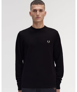 This classic crew neck jumper is built with a blend of ethically sourced merino wool and cotton for warmth, durability, and a bit of simple luxury. Designed in signature Fred Perry colours with twin tipping inside the neck, this is a smart staple for year-round wear. For warming up on the courts or layering up on the streets.
52% Wool / 48% Cotton
K9601