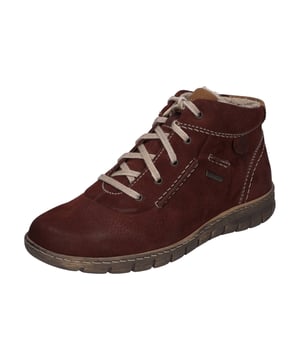 Entdecke die Essenz von Bequemlichkeit und Charakter mit der Steffi 53 Stiefelette in bordo, einem exquisiten Beitrag von JOSEF SEIBEL zur Damenmode. Diese Stiefelette verkörpert eine harmonische Verbindung aus Style und Wohlbefinden, dank ihres Obermaterials aus hochwertigem Rindsleder in Nubuk-Qualität. Das warm gefütterte Innenleben aus Textil verspricht behagliche Wärme in den kühleren Monaten, während die herausnehmbare Innensohle Flexibilität für individuelle Bedürfnisse bietet. Der bordo Farbton unterstreicht die Einzigartigkeit dieses Modells und macht es zu einem vielseitigen Begleiter für jegliche Freizeitaktivitäten. Von einem entspannten Spaziergang im Freien bis hin zu einem gemütlichen Treffen mit Freunden, die Steffi 53 unterstützt jeden Schritt mit einer PU-Sohle, die nicht nur für ihre Leichtigkeit, sondern auch für ausgezeichnete Dämpfungseigenschaften bekannt ist. Die wasserabweisende Beschaffenheit und die traditionelle Schnürung bieten zusätzlichen Schutz und Anpassungsfähigkeit. Das Modell ist Teil der Spirit of Nature Kollektion, die sich durch eine charakterstarke Designphilosophie und den Einsatz traditioneller Handnaht auszeichnet. Die Herstellung nach der AGO-Machart, eine moderne Fertigungstechnik, die Langlebigkeit und Formbeständigkeit gewährleistet, spiegelt die Hingabe von JOSEF SEIBEL zur Qualität und zum respektvollen Umgang mit Ressourcen wider. Diese Stiefelette ist mehr als nur ein Schuh; sie ist ein Statement für bewusste Modeentscheidungen, fernab von der Schnelllebigkeit der Fast Fashion. Mit der Steffi 53 entscheidest du dich für ein Produkt, das nicht nur durch sein äußeres Erscheinungsbild, sondern auch durch seine inneren Werte überzeugt.