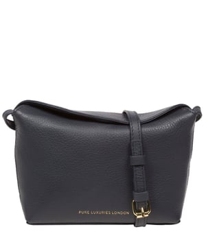 The 'Lolo' cross body bag from the Pure Luxuries Marylebone collection is handcrafted from high-quality, genuine Nappa leather with a natural super-soft touch. The bag is secured by a magnetic closure which opens to reveal a 100% cotton-lined interior and includes two slip pockets. Features gold-coloured metal fittings alongside the adjustable slim leather strap, with a maximum drop length of 65cm. The Pure Luxuries logo is embossed in gold foil for a beautifully simple finishing touch.