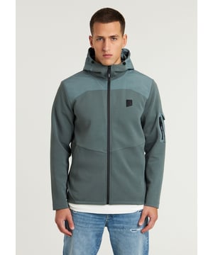 Das Lion Mix ist eine Regular Fit Sweatjacke mit Reißverschluss und gewebter Struktur. Ausgestattet mit einer Nylon-Kapuze, Seitentaschen mit Reißverschluss, einer Ärmeltasche und signature CHASIN'-Details.