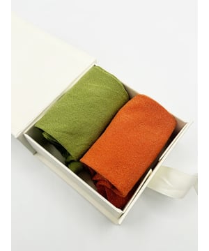 Get into the spirit of the season with this fun and vibrant glitter sock set by SVNX. Featuring two pairs in bold orange and green, they're perfect for adding a pop of sparkle to any outfit. Treat yourself or surprise someone special with a gift that combines style and festive flair! Knitted Glitter Socks Set. One size. 2 pairs. Gift Box. Cotton/Polyamide/Elastane. Wash at 40. Made in China