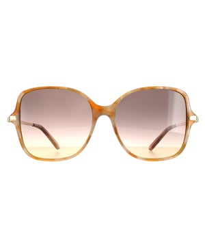Salvatore Ferragamo Square Ladies Blonde Havana Gray Gradient SF990SR Las SF990SR son unas glamurosas gafas cuadradas de gran tamaño fabricadas en acetato ligero. El logotipo de Salvatore Ferragamo figura en las finas patillas para garantizar la autenticidad de la marca.