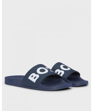 Signature slides made in Italy by BOSS Menswear. Crafted in lightweight materials, this summery pair has a large BOSS logo on the upper.

Fastening top: Slip-on
Partially lined

Upper material: 98% Polyvinyl chloride, 2% Polyurethane, Lining: 100% Polyester, Sole: 70% Polyvinyl chloride, 30% Thermoplastic polyurethane, Innersole: 70% Polyvinyl chloride, 30% Thermoplastic polyurethane
50536835
 