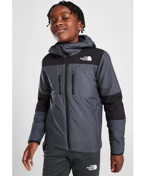 The North Face Licht synthetisch jack van The North Face. Dit regular-fit jack is uitgevoerd in de kleur Vanadis Grey met zwarte panelen. Het is gemaakt van een gladde, duurzame geweven polystof met Windwall-technologie voor langdurige bescherming, met een lichte synthetische vulling om de hitte vast te houden. Het beschikt over een ritssluiting over de volledige lengte met een verstelbare capuchon om de bedekking te vergroten, met open steekzakken en zakken met rits op de borst voor opbergruimte. Het heeft een elastische band rond de randen om de pasvorm te garanderen, en is afgewerkt met het kenmerkende The North Face-logo op de borst en de schouder.