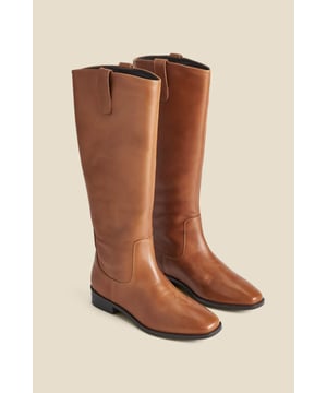 Comfy and chic - the best kind of bootsMade from luxurious soft leatherTimeless riding boot with a slim silhouette Trending square toe Effortlessly cool with skinnies and a slouchy knitStyle with shift dresses for a smart office look