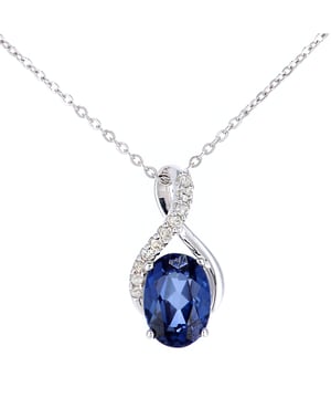 9K (375) witgoud: 1,11 gram; # Diamant: 0,04 ct; # Gemaakt Tanzaniet: 1,12 ct