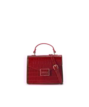 This Carvela Jessica Top Handle Bag features a deep red exterior with large croc print. There is a gold branded plate on the front flap. Dimensions: 15cm (H), 17cm (L), 7cm (D). Strap length: 125cm.