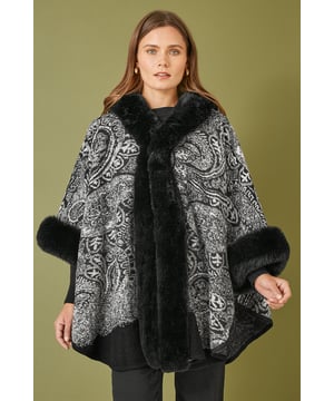 This cosy cape is perfect for the new season and the cooler weather incoming. In a paisley design that will be super easy to style with your casual everyday fits, The lovely soft knit looks perfect with denim and a roll neck jumper. With a luxury faux fur trim at the collar and cuffs.