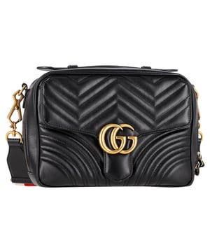 VINTAGE, RRP AS NEW
Elevate your accessory game with the Gucci Small GG Marmont Matelassé Zipped Camera Shoulder Bag in sleek black leather. Featuring the signature GG logo in gold-tone hardware, this bag exudes luxury and timeless style. The matelassé quilting gives it a rich, textured finish, while the black leather offers a versatile base that pairs effortlessly with any outfit. Designed for the modern woman on the go, the small size is perfect for carrying essentials, while the zipped closure ensures your belongings stay secure. The adjustable shoulder strap allows for a customizable fit, whether you wear it on your shoulder or crossbody. With its chic design and refined craftsmanship, this bag is the epitome of effortless elegance.

Gucci Small GG Marmont Matelasse Zipped Camera Shoulder Bag in Black Leather 

Condition: Excellent
Signs of wear: No retail tag, No visible sign of wear., 
Packaging: Dust bag
Color: Black
Material: Leather | leather
Size: One Size | One Size
Measurements: Width: 80; Height: 200; Length: 280
SKU: NAPPUGBBA410477W