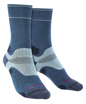 Bridgedale - Women’s Merino Wool Performance Boot SocksOriginally named the Women’s Trekker, this sock changed the expectations of hiking socks for women forever. The Hike Midweight Merino Performance Sock ensures feet stay dry and comfortable all day, on any adventure. Engineered advanced zonal padding system for support and comfort this is the ultimate sock for long or multi day expeditions.Merino Performance Fusion Technology provides resilient padding, balanced insulation, moisture wicking and outstanding durability for all day comfort. Merino wool is also well known to be some of the softest material out there, guaranteeing maximum comfort.The Performance Fit is close and supportive and won't slip down or bunch in your footwear. The Flat Toe Seam minimises bulk that could cause irritation in the toe box and the sock is kept securely in place with an Elasticated Arch and 3D-shaped heel cup.Built on a structure of Lycra® and set by Bridgedales Thermofit process ensures the sock returns to its original shape and size after every wash. Tested and loved by 1000's of walkers, hikers and explorers this sock is one of the best hiking socks out there.These socks are made from 38% Nylon / Polyamide, 26% Wool, 18% Merino Wool, 17% Endurofil™/ Polypropylene, 1% Lycra® / Elastane and come in 4 different colours: Berry, Blue/Sky, Silver/Grey & Lilac/Purple. They come in 4 sizes: Small (3-4.5 UK), Medium (5-6.5 UK), Large (7-8.5 UK) and are Machine WashableExtra Product DetailsBridgedale Ladies Boot SocksPerformance FitMerino Wool FibresFlat Toe SeamsGreat For HikingMoisture Wicking4 Colour OptionsAll Day ComfortElasticated ArchAdvanced Padding System3 Sizes AvailableMachine Washable