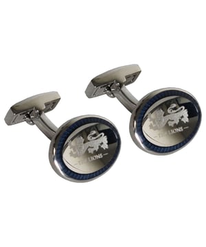 Hackett London Lions Men's Silver/Navy Cufflinks – a regal and sophisticated accessory that adds a touch of elegance and character to your formal attire. These cufflinks are a testament to Hackett London's commitment to quality craftsmanship and attention to detail. Here are the key features of these distinguished cufflinks:

 Premium Quality:  Crafted with precision and care, these cufflinks are made from high-quality materials, ensuring durability and a polished appearance. Hackett London is renowned for its dedication to quality craftsmanship.

 Lion Emblem Design:  These cufflinks feature a striking lion emblem design, showcasing the iconic Hackett London logo. The lion symbolizes strength, majesty, and leadership, making these cufflinks a symbol of confidence and distinction.

 Silver and Navy Color Scheme:  The combination of silver and navy adds a touch of sophistication to these cufflinks. The silver tone exudes refinement, while the navy background provides depth and contrast, making these cufflinks visually captivating.

 Easy Application:  The cufflinks come with a simple and secure fastening mechanism, allowing you to easily attach and remove them from your shirt cuffs. They are designed for convenience and ease of use.

 Versatile Styling:  These cufflinks are versatile and can be paired with a range of dress shirts and suits. They add a touch of character and personality to your outfit, making them suitable for formal events, business meetings, and other occasions where you want to make a lasting impression.

 Durable Construction:  Hackett London's commitment to quality ensures that these cufflinks are built to last. They are designed to withstand regular use without losing their shine or charm.