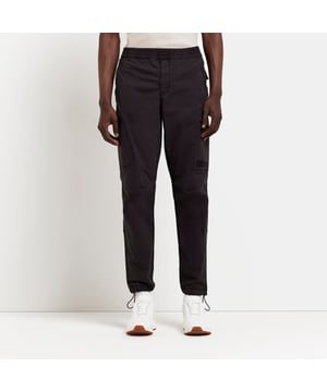 Regular fit, Washed black, Multi pocketing, Elasticated waist, Cuffed bottoms, Our model wears a UK M and is 185.5cm/6'1'' tall, Cotton for this product has been responsibly sourced.