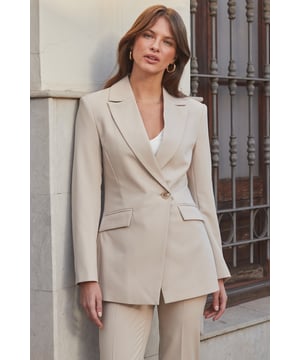 It's not like your other blazers
Cut to cinch your waist
Asymmetric hem for a luxe silhouette
Patterned lining, because it's all in the details
You're going to need the matching trousers
Throw over jeans and a nice to for drinks