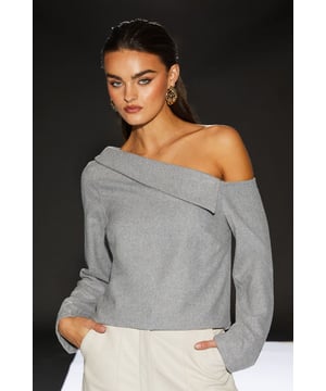 Asymmetric fold-over design for a unique silhouette
        Off-shoulder Bardot neckline adds a touch of allure
        Long sleeves for versatile styling options
        Wool blend fabric offers warmth and comfort
        Part of the exclusive RUNWAY 1.8.1.8 collection
    
    Make a statement with this Runway 1.8.1.8 Wool Blend Fold Over Asymmetric Top. The distinctive fold-over design and off-shoulder neckline create a captivating silhouette that's both edgy and feminine. Perfect for the confident woman who loves to stand out, this top can be styled for various daytime occasions. Pair it with wide-leg trousers and statement earrings for a chic family gathering, or dress it down with your favourite denim and trainers for a casual weekend look. The long sleeves offer adaptability, allowing you to push them up for a more relaxed feel or wear them full-length for a sleek appearance. This versatile piece from the RUNWAY 1.8.1.8 collection effortlessly transitions from day to night, making it a must-have addition to your wardrobe.