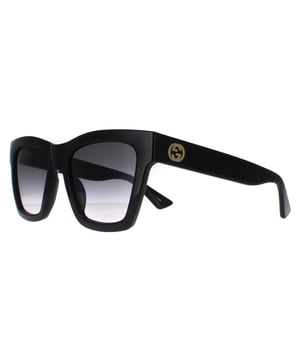 Gucci Square Womens Black Grey Gradient GG1714S  Sunglasses are a masterful blend of modern sophistication and luxury, designed for those who appreciate bold fashion statements. With a distinctive, oversized frame featuring sleek, angular lines, these sunglasses add an edge to any look while maintaining an air of elegance. The iconic double-G logo on the temples underscores Gucci's legacy of impeccable craftsmanship and attention to detail. High-quality lenses offer excellent UV protection, ensuring comfort and safety under the sun. Available in an array of stylish colors, the GG1714S model is perfect for those looking to make a striking impression with an accessory that embodies both contemporary flair and timeless appeal.
