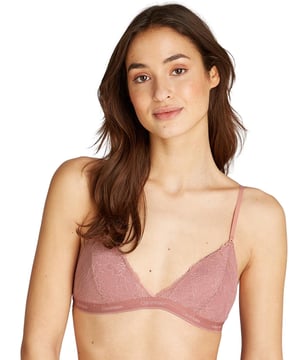 Revolutionize your lingerie collection with the Calvin Klein Modern Lace triangle bra. Designed with a plunging neckline, this triangle bra is perfect for wearing under low-cut tops and dresses. The gorgeous lace cups add a touch of sophistication and femininity, making you feel truly fashionable. But that's not all – this bra is wireless and not padded for maximum comfort, giving you the freedom to move without any uncomfortable underwire digging into your skin. The moulded cups provide just the right amount of shaping and support, giving you a beautiful silhouette. And of course, it wouldn't be a Calvin Klein product without the signature waistband, adding a touch of designer to your underwear drawer. Adjustable shoulder straps ensure the perfect fit for your body, while the convenient hook and eye closure allows for easy wearing and removal. And let's not forget about the matching coordinates available, so you can complete your dream lingerie set.

Triangle bra
Plunging neckline
Gorgeous lace cups
Wireless for comfort
Non-padded
Moulded for shaping
Calvin Klein signature waistband
Adjustable shoulder straps
Hook and eye closure
Matching coordinates available
Country of origin: Indonesia
Composition: 80% Nylon | 20% Elastane
Listed in UK sizes
 Non-Wired Bra