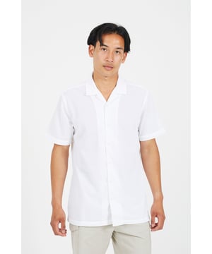 Elevate your wardrobe with this stylish zigzag lace revere collar shirt from Brave Soul. Designed for those who appreciate both classic and contemporary style, this shirt offers a sophisticated touch with its unique zigzag lace pattern. Featuring a classic revere collar, and stylish branded pearl effect buttons providing a refined, elevated touch to the design. With short sleeves and a regular fit, this shirt combines comfort and style in one essential piece. Model wears UK size M.