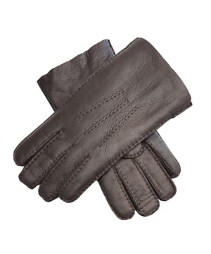 Introducing our Men's Classic Gloves, handcrafted with precision from the finest 100% genuine lambskin. These gloves celebrate the timeless beauty of simplicity, highlighting the luxurious texture and superior quality of lambskin. Each stitch is meticulously placed, ensuring a perfect blend of durability and style.
With a versatile wrist-length design, the gloves can be worn cuff-down for a sleek, polished look or turned up for added warmth and character. The soft, supple lambskin feels buttery smooth against the skin while offering excellent insulation for cooler days. Made in Portugal by skilled artisans, these gloves reflect our dedication to exceptional craftsmanship and premium materials.
Sizing and Fit
These gloves may feel snug initially, but with a few hours of wear, the lambskin will naturally stretch and conform to your unique fit.