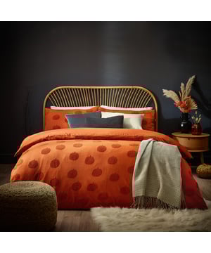 When the nights are drawing in and the weather is turning, why not add this warming duvet cover set, which is a pared back autumnal take on Halloween. Adorned with soft tufts of cotton in the shape of pumpkins and surrounded by a spiced orange 100% cotton fabric. This design adds a pop of colour to your bedroom, providing an elegant alternative to traditional Halloween décor.