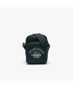 Mini Roland Garros Edition Shoulder Bag Dimensions: L5.2 x H7 x D2in - L13.5 x H18.5 x D5.5 cm Recycled polyester outer Adjustable strap: 29’’ - 55’’ - 73cm - 140cm 1 outside pocket  1 inside pocket Crocodile on side