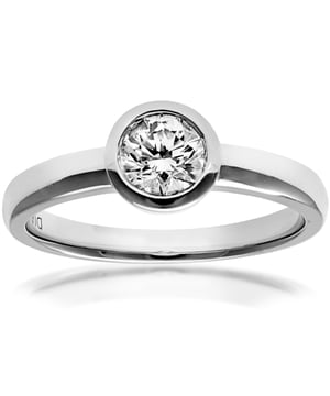 18K (750) witgoud: 3,4 gram; # Diamant: 0,5 ct
