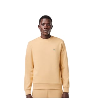 Timeless style renewed every season in a new color palette  in our signature details and a sustainable approach. Classic fit  natural ease on body with comfortable sleeves. Solid crewneck sweatshirt in brushed fleece made of organic cotton and recyled polyester. Piqué necktape in iconic Lacoste green. Embroidered 3cm green crocodile sewn on chest.