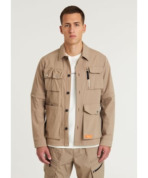 The Mount Utility is a regular fit overshirt made from ribstop fabric with detachable sleeves, featuring utility pockets, including 4 chest pockets and 3 body pockets.