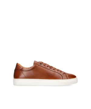 This KG Kurt Geiger Fire sneaker is crafted from a rich tan leather. The front is laced up with embossed logo on the tongue.