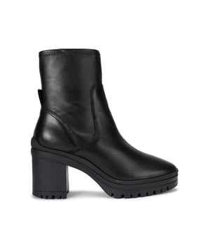 This Carvela Serin Sock ankle boot is crafted from a soft black leather with texture. The sock ankle is soft for slip-on comfort and heel is in a chunky block style. Heel height: 6.5cm.