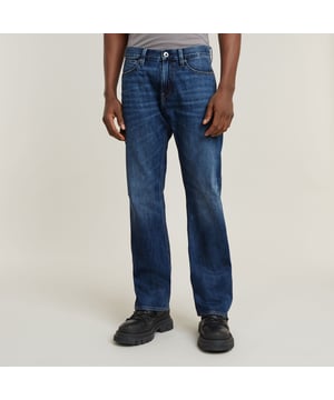 Zip fly. 5 pockets, incl. coin pocket caught in the seam. Tool loop at the side. G-Star RAW label at the back, made from a leather-like paper fabric. Zip & button closure. Mid waist. The Lenney jeans is designed in a straight fit that widens in a bootcut silhouette. The tool loop at the side adds interest. 100% Cotton. Rigid. Weight 11.3 oz. Bootcut