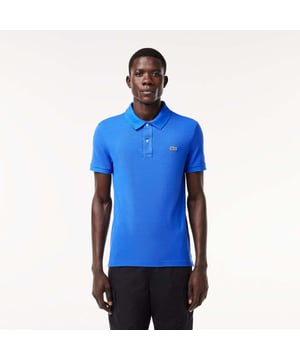 Lacoste  inventor of the polo since 1933. Original L.12.12 Polo. Made by Lacoste. The Icon. Slim fit  adjusted ease on body Adjusted version of the Original L.12.12 polo in our iconic petit pique renewed every season in a new color palette Ribbed collar and cuffs Side slits Fake mother of pearl buttons 3cm green crocodile at chest