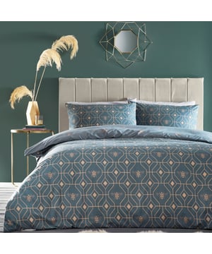 A subtly geometric honeycomb patterned duvet set, on a French blue background, featuring buzzing bees and ideal for a neutral setting. The reversible design offers an alternative pattern to choose from. The choice is yours!