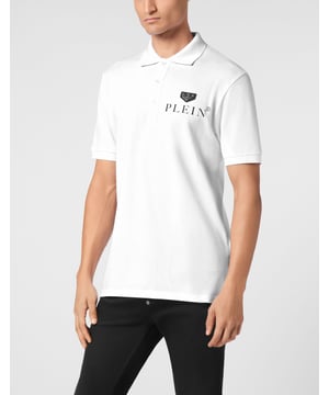 Peppen Sie Ihre Freizeitgarderobe mit diesem einfachen Poloshirt auf.    Philipp Plein Logo-Schriftzug elegant auf der Brust dargestellt.   Gefertigt aus hochwertiger Baumwolle für ultimativen Komfort   Perfekt zum Überziehen oder als Einzelstück   Ein Must-Have für den modernen, stilvollen Menschen