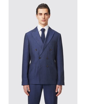 Crafted from pure soft linen, The Fairmont double breasted suit jacket in navy will recharge your energy levels for tailoring. All it needs is a classic white crisp shirt or a finely knitted jumper to elevate the look. The jacket features a shawl lapel, straight flap pockets and kissing buttons on the cuffs. Pair the jacket with the matching suit trousers to complete the full look.