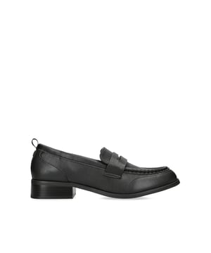 The KG Kurt Geiger Millie loafer features a black upper with cut out strap. There is a gunmetal pin and KG Kurt Geiger branded tab at the back of the ankle. Heel height: 3cm.