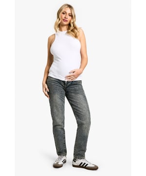 High-waisted design for comfortable support
        Relaxed mom-jean silhouette for effortless style
        Versatile denim fabric suitable for everyday wear
        Adaptable waistband to accommodate growing bump
        Classic five-pocket styling for practicality
    
    Embrace comfort and style during your pregnancy with these essential high-waisted mom jeans from Boohoo. Crafted to flatter your changing figure, these jeans offer a relaxed fit that doesn't compromise on fashion-forward appeal. The adaptable waistband ensures a snug yet comfortable fit as your bump grows, while the classic denim fabric maintains its shape wear after wear. Style these versatile jeans with a fitted tank top and trainers for a casual daytime look, or dress them up with a floaty blouse and ankle boots for family gatherings. The timeless design makes these jeans a wardrobe staple that will see you through your pregnancy and beyond, offering both comfort and confidence for all your casual occasions.