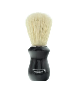 The Merchant of Venice Black Shaving Brush is a luxurious grooming accessory crafted for a refined shaving experience. Designed with high-quality bristles, it creates a rich, creamy lather that enhances the smoothness of your shave, ensuring comfort and precision. Its sleek black handle provides an elegant, ergonomic grip, making it both stylish and functional. Perfect for those who appreciate classic shaving tools with a touch of sophistication.