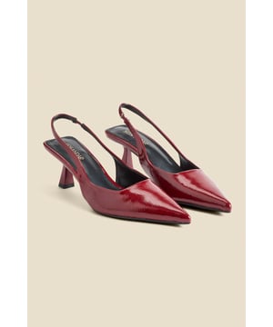Accessories on point Crafted from luxe crinkle leather in a stunning cherry red patent finishChic slingback with an elasticated insert for a comfortable fit Sexy pointed toe silhouetteSet on a super-wearable flared kitten heel We love them with jeans and a blazer