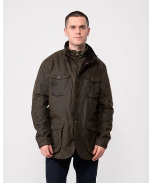 Barbour Ogston Wax Jacket
Smart and stylish, the Ogston is a hard-working jacket cut for a relaxed, masculine fit and crafted in Barbour’s heavyweight Oban waxed cotton, which offers robust weather defence with a suede-like matte finish. An integral quilted vest creates an outdoorsy look and provides an extra layer of warmth, fastening through to a stand collar with a Barbour branded zip. The outer jacket itself adds yet more practicality with hardy stud fastenings and four roomy pockets, plus distinctive details including leather elbow patches corduroy facings. The luxurious wool-mix lining adds an air of elegance and refinement to this rugged winter jacket.

Tailored fit
Outer: 100% Cotton (Waxed)
Inner: 100% Cotton
Do not wash
Sponge clean only
Back length: 74.5cm

MWX0700