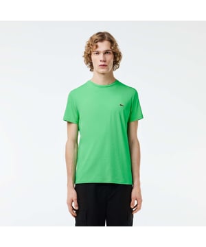 The essential tee-shirts of Lacoste wardrobe Our iconic crewneck tee-shirt in Pima cotton jersey renewed every season in a new large color palette Regular fit, natural ease on body Premium soft Pima cotton Lacoste Men SPW transfer print inside neck at back 2 5cm green crocodile on chest. Material: 100% Cotton. Ref: TH6709UYX.