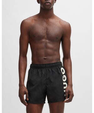 Modern swim shorts by HUGO. Designed in quick-drying fabric with full lining, this beach-ready pair features a vertical logo printed in contrast.
100% Polyester (recycled) , Lining: 100% Polyester
50513979