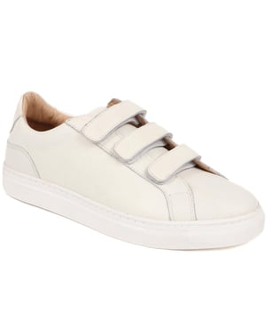 Flavia brings glossy finesse to the trainer game, pairing patent leather with everyday wearability. Elevate your stride; these are more than just trainers, they're a statement.