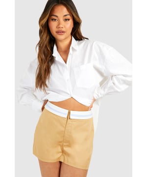 A pair of shorts that resemble a skirt...what more could a girl want? Designed to give you a bit more freedom while still looking cute, this skort is the perfect combination of style and practicality. From floaty skorts for summer days to white skorts perfect for showing off those bronzed pins, just team with chunky trainers and a crop top and your go-to off duty look is sorted. Summer styling has literally never been this easy. From trending cargo skorts to floaty printed options, shop it all on boohoo.Style: SkortsFabric: PolyesterLength: Short