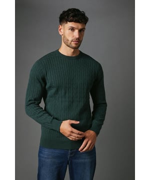 Cotton Cable Crew Neck from Maine. Upgrade your knitwear attire with statement styles and discover this must-have men's cotton jumper. Featuring long-fitted sleeves with stretch cuffs, a circular neckline, and a tailored cut finish for the perfect fit.  Made from 100% Cotton. Wash at 40. Model wears a Size M.