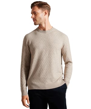 De Ted Baker trui met ronde hals is vakkundig vervaardigd van een hoogwaardige wolmix, met een rijk, getextureerd T-breisel dat moeiteloos een vleugje verfijning toevoegt aan koelere dagen. De lange mouwen bieden warmte, terwijl het klassieke ronde halsontwerp zorgt voor een tijdloze uitstraling. Dit veelzijdige stuk is ideaal voor diverse gelegenheden.