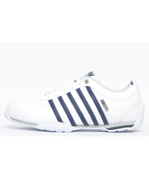 The K Swiss Arvee 1.5 mens are a sleek and athletic everyday training shoe that is perfect for a versatile range of occasions. Whether dressed down during the day or smartened up for an evening event, the K Swiss Arvee boasts a designer look that makes it a terrific addition to your footwear collection. The upper of the Arvee is crafted from a leather that keeps feet supported and protected whilst a classic lace up front offers a safe and secure fit. The K Swiss logo sits proudly on the tongue whilst the iconic 5 stripes adorn the side providing a winning finishing look to these designer trainers. 
 - Premium leather upper 
 - Padded heel and tongue. 
 - Full lace closure
 - K-Swiss Chrome Lace Tag
 - Durable rubber outsole 
 - K Swiss branding throughout