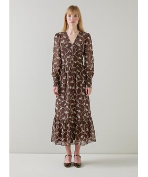 A dreamy addition to your wardrobe, our Lucian dress in chocolate and birch brings elegance and charm effortlessly. This sketchy flower print tiered dress, woven from high-quality fabric, features a flattering V-neck and full length sleeves for a timeless look. Perfectly pair it with ankle boots or strappy heels for your next smart casual affair.