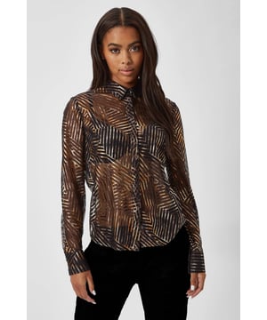The Capaldi shirt ticks all the boxes if you're looking for the perfect evening shirt. The metallic print running throughout the black lace base is complimented by the formal shirting details such as the point collar and covered button placket. Wear over a cute bra and pair with black suit trousers for an effortlessly chic outfit.
 
Model is 5'7" (170cm) and 32.5" (82cm) bust and wears a Size 10.
