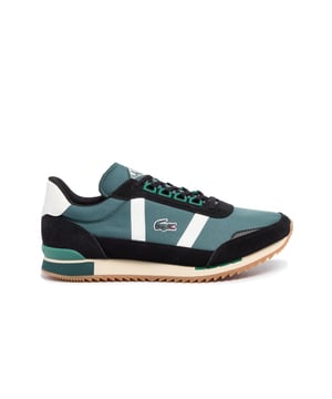 The Lacoste Partner Retro 319 1 SMA Men's Green/Black Trainers offer a blend of sporty elegance and retro vibes, featuring a distinctive color combination and the classic Lacoste branding. Designed for both style and comfort, these trainers are a great choice for individuals who appreciate a timeless yet contemporary look.

Key Features:

 Retro-Inspired Design:  The Partner Retro 319 1 SMA trainers draw inspiration from Lacoste's heritage, featuring a classic silhouette with modern accents that make them stand out.

 Green and Black Color Combo:  The combination of green and black provides a stylish contrast, adding an eye-catching element to your footwear.

 Comfortable Fit:  These trainers are designed to offer a comfortable fit, allowing you to wear them for extended periods without discomfort.

 Durable Construction:  Lacoste is known for its quality, and these trainers are built to withstand daily wear while maintaining their style.

 Lacoste Crocodile Logo:  The iconic Lacoste crocodile logo on the side of the trainers symbolizes the brand's commitment to quality and timeless style.

 Versatile Style:  These trainers strike a balance between a sporty and casual look, making them suitable for a variety of occasions, whether you're going for a stroll or meeting up with friends.

 Classic Tennis Shoe Features:  With their retro tennis shoe design elements, these trainers evoke a sense of vintage charm while still offering a contemporary edge.

 Breathable Construction:  The trainers are designed with breathability in mind, ensuring your feet stay cool and comfortable throughout the day.

 Lace-Up Closure:  The lace-up design provides a secure fit, allowing you to adjust the tightness to your preference.